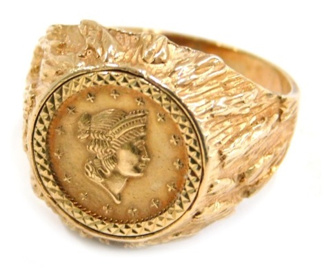 A 9ct gold coin set dress ring, the central Liberty quarter dollar, in a bark effect ring mount, ring size V, 7.5g all in.