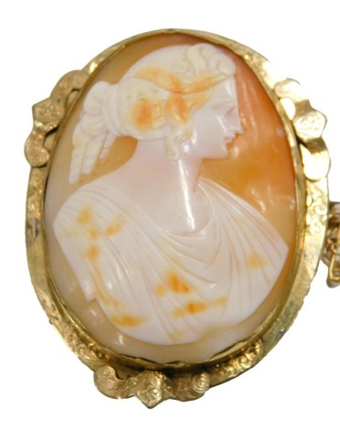 A 19thC shell cameo portrait brooch, the oval cameo set with maiden head in flowing robes, in a gold coloured Pinchbeck border, on single pin back with safety chain, 5.5cm x 4cm, 12.7g all in.