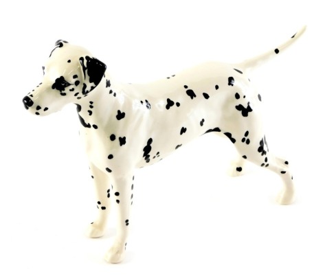 A Beswick pottery figure modelled as the Dalmatian Arnoldene, 14.5cm high.