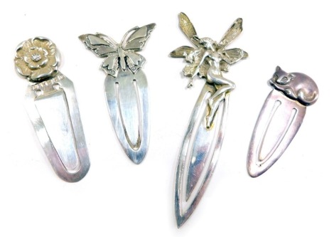 Four silver bookmarks, each end cast with a butterfly, Yorkshire rose, Sheffield 1986, fairy and cat.