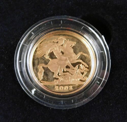 A Royal Mint gold proof full gold sovereign dated 2008, with certificate of authenticity number 2663, boxed.