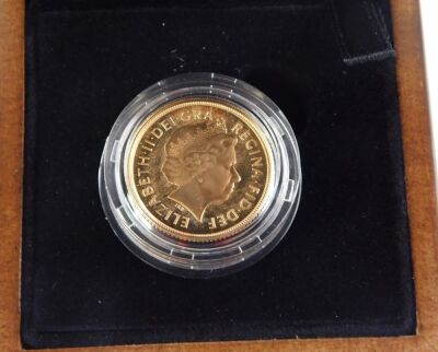 A Royal Mint gold proof full gold sovereign dated 2008, with certificate of authenticity number 2663, boxed. - 2