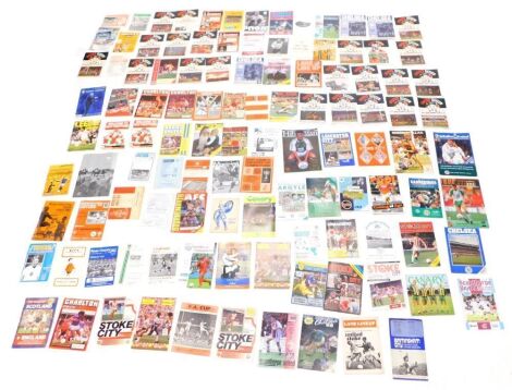 A large quantity of football programmes.