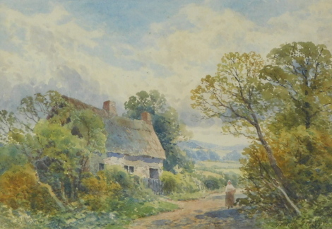 Frank Gresley (1855-1936). Figure outside Thatch Cottage, watercolour, signed, 18cm x 27cm.