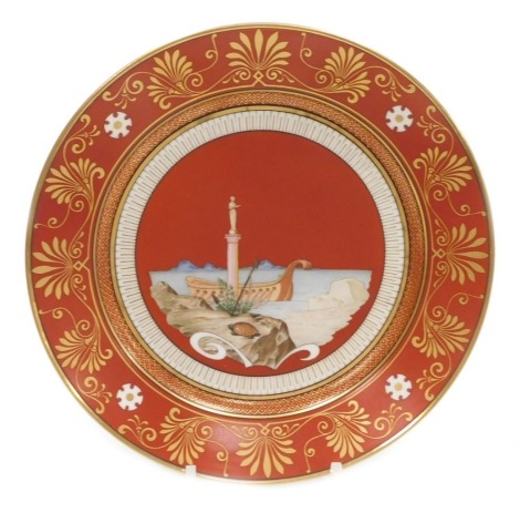 A mid 19thC Sevres Etruscan red ground hard paste porcelain dessert plate, decorated with a ship in harbour, figural column and a terrapin, within a stylised gilt anthemion leaf and scroll border, Napoleon crowned 'N' mark in iron red, 24cm diameter. Auct