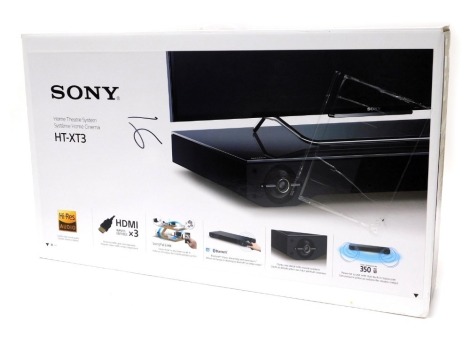 A Sony home theatre system, HT-XT3 boxed, 8cm high, 75cm wide, 35cm deep.