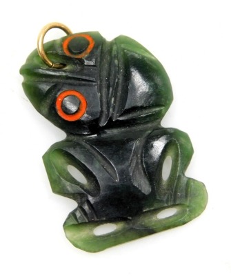 A New Zealand Maori Hei-tiki carved jade pendant, 3cm high.