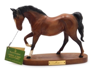 A Royal Doulton pottery equestrian sculpture of Max, brown matt, raised on an oval vase, printed marks, 25cm wide.