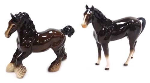 A Beswick pottery figure of a cantering Shire horse, brown gloss, printed marks, and a further figure of a standing brown horse. (2)