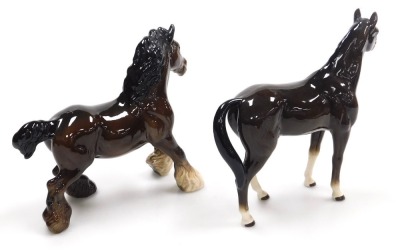 A Beswick pottery figure of a cantering Shire horse, brown gloss, printed marks, and a further figure of a standing brown horse. (2) - 2