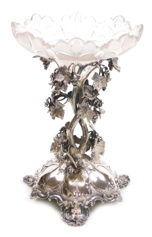 A Victorian silver plate and cut glass comport, by Muirhead and Son, Glasgow, with a leaf engraved frosted glass bowl, above a stem cast with vines, on a Rococo base with scroll feet, impressed marks, 29.5cm high.