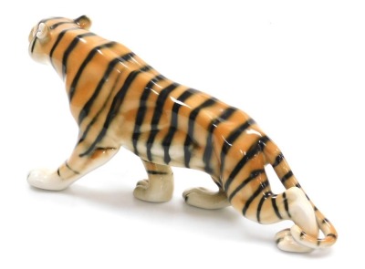 A Royal Dux porcelain figure of a tiger, number 32/1 55, impressed and printed marks, 38cm wide. - 2