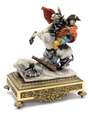 A Capodimonte porcelain figure of Napoleon crossing the Alps, after Jacques-Louis David, modelled by Bruno, raised on a brass plinth, 35cm high. (AF)