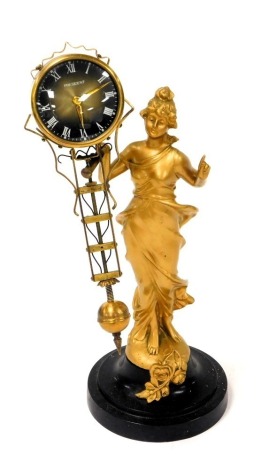 A President Art Nouveau style gilt metal pendulum clock, circular black dial bearing Roman numerals, clockwork movement, the circular case and pendulum supported by a stylized lady, raised on black socle base, with integral key, 34cm high.