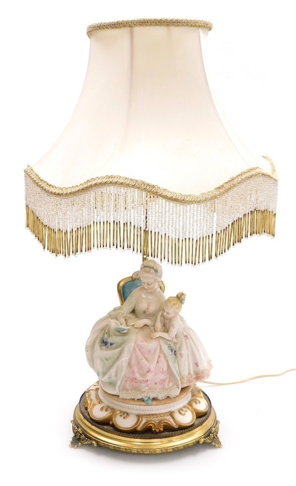 A Capodimonte porcelain figural table lamp, modelled as an