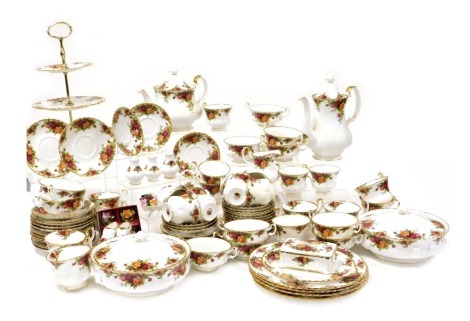 A Royal Albert Old Country Roses pattern part dinner, tea and coffee service, including a pair of vegetable tureens and covers, four dinner plates, two and three tier cake stands, coffee and teapots, soup cups and saucers, tea and coffee cups, saucers and