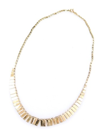 A 9ct gold fringe necklace, on a bolt ring clasp, 6.0g.