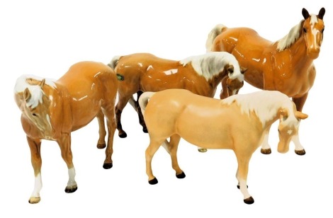 Four Beswick pottery Palomino horses, one matt, printed marks.