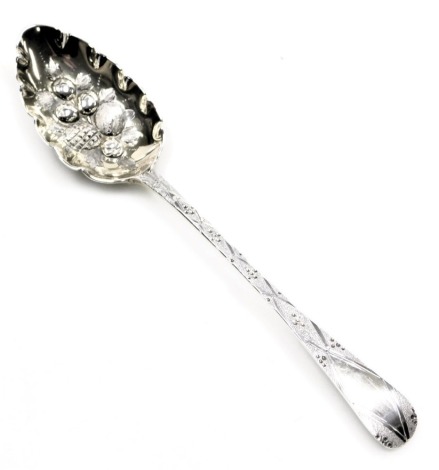 A George III silver Old English pattern serving spoon, later worked as a berry spoon with embossed and chased decoration, London 1818, 2oz.