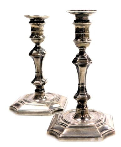 A pair of Edward VII loaded silver taper sticks, in the seventeenth century style, Sheffield 1901, 8.66oz, 11.5cm high.