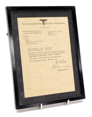 A letter to Gauleiter Paul Giesler, on German National Socialist headed paper, dated 4 August 1938, with birthday wishes, signed Bormann, framed.