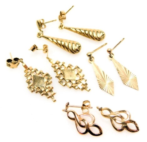 Four pairs of 9ct gold earrings, 5.2g. (AF)