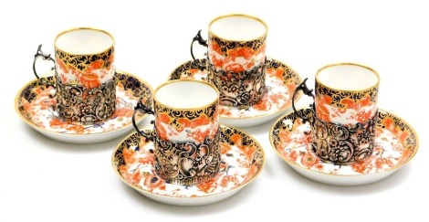 A set of early 20thC Royal Crown Derby Imari porcelain demi-tasse coffee cans and saucers, pattern number 2649, the cups with embossed and pierced silver holders, London 1906.