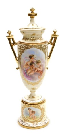 An early 20thC Dresden porcelain vase and cover on a socle base, decorated with reserves of cherubs, within a yellow ground, gilt heightened with flowers and foliate scrolls, number 18819, printed and painted marks, 42cm high.