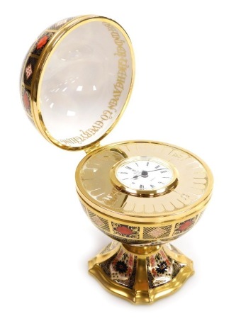 A Royal Crown Derby Imari Millenium Globe Clock, for Sinclairs, limited edition 805/1000, the clock with quartz movement, printed mark, 19cm high.