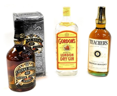 A bottle of Chivas Regal Premium Scotch Whisky, aged twelve years, one litre, together with a bottle of Teachers Highland Cream Scotch Whisky, one litre, and a bottle of Gordon's Special London Dry Gin, one litre (3)