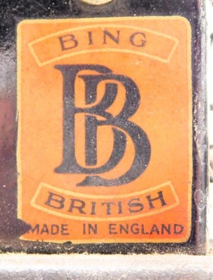 An early 20thC Bing film projector, together with a tin containing a cinematograph film. (2) - 3