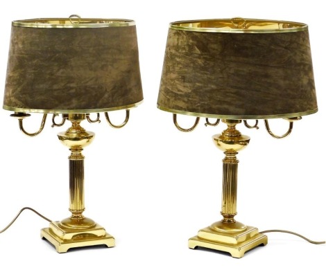 A pair of Adam style brass twin branch table lamps, with brown suede shades, 62cm high. Buyer Note: WARNING! This lot contains untested or unsafe electrical items. It is supplied for scrap or reconditioning only. TRADE ONLY