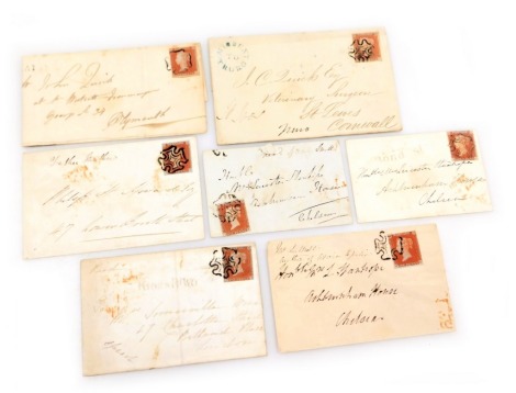 Philately. Seven Queen Victoria penny red unperforated stamp envelopes with black Maltese Cross imprint.