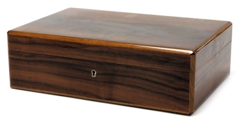 A Dunhill hardwood humidor, with key, 11cm high, 37.5cm wide x 24.5cm deep.