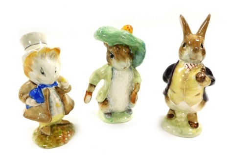 Three Beswick Beatrix Potter figures, brown back stamp, comprising Amiable Guinea-pig, Mr Benjamin Bunny, and Benjamin Bunny. (1, AF)