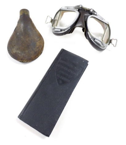 A pair of Stadium brown leather driving goggles, brass and leather shot flask and Hoppus's Measurer, revised edition, edited by Richardson. (3)