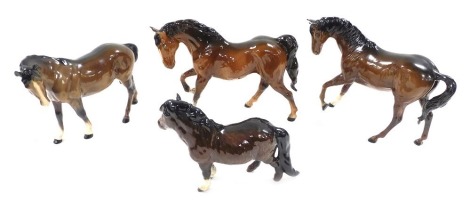 Four Beswick pottery brown gloss horses.