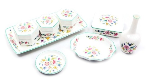 A group of Minton porcelain Haddon Hall ornaments, including boxes and covers, rectangular dish, and a posy vase. (qty)