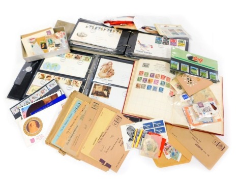 Philately. Two albums of first day covers together with GB and world stamps, mint and used, including three books of first class stamps.