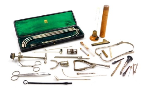 A set of late 19thC Arnold and Sons silver plated catheters, cased, and surgical tools including a Jessop blood letting tool.