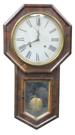 A Victorian rosewood cased drop dial wall clock, for W Padgett of Newark, circular dial bearing Roman numerals, subsidiary seconds dial, eight day Verdi movement, by the EN Welch Mfg. Company, Forestville, Conn, USA, the case of octagonal form, above a gl