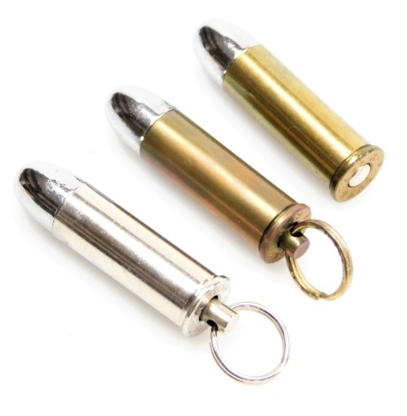 A forty four magnum silver bullet cigar cutter, and two further forty four magnum cigar cutters, with tie bag and instructions, all boxed. (3)