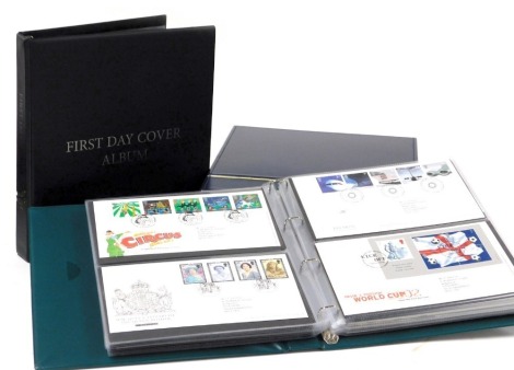 Philately. Queen Elizabeth II first day covers, in three albums, one with slipcase.