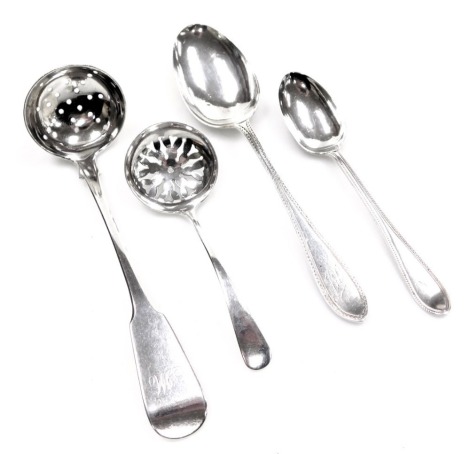 A George IV Scottish silver sugar sifter spoon, initial engraved John Murray/Muir, Glasgow 1828, Elizabeth II Scottish silver sifting spoon, Edinburgh 1977, and two silver teaspoons, 3.45oz.