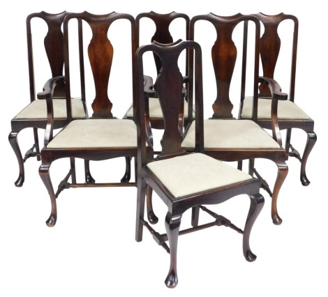 A set of six early 20thC Georgian style mahogany dining chairs, with drop in seats, raised on cabriole legs, comprising a pair of carvers and four single chairs.