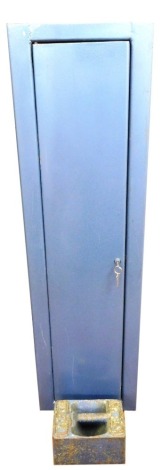 A blue metal gun cabinet, 127cm high, together with an Imperial 56lb weight, and dust sheets.