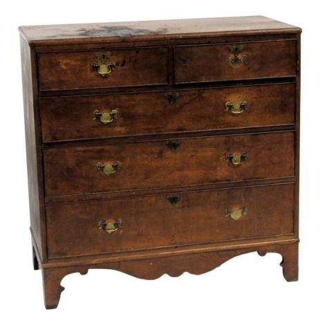 A George III oak chest, of two short over three long graduated drawers, raised on bracket feet, 107cm high, 107cm wide, 50.5cm deep.