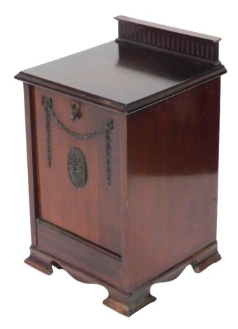 A Victorian mahogany coal purdonium, the hinged front with a lead liner, raised on bracket feet, 64cm high, 38.5cm wide, 38.5cm deep.