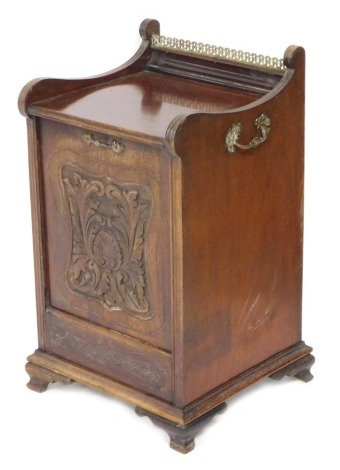 A Victorian mahogany coal purdonium, with a foliate and shell carved drop front, enclosing a lead liner, raised on bracket feet, 68cm high, 39cm wide, 38cm deep.