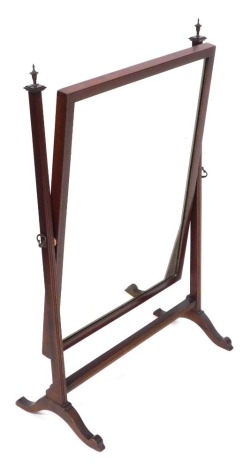 An Edwardian mahogany and line inlaid swing frame toilet mirror, with a rectangular glass plate, raised on fluted supports, 84cm high, 53.5cm wide.